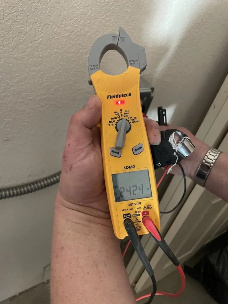 Voltage testing with clamp meter during Outlet Installation in Tuscarora